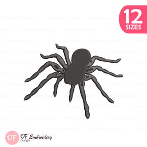 May include: A detailed, dark grey spider embroidery design with 8 legs and a textured body. The design is set against a white background. The image includes the text "12 SIZES" in a pink circle and the "DF Embroidery design" logo.
