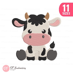 May include: An embroidered cartoon cow design in black, white, pink, and brown. The cow is sitting with its legs tucked under, and has large eyes and a pink nose. The image includes the text "11 SIZES" in a pink circle.