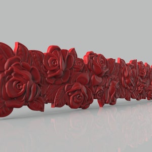 May include: A red 3D printed rose garland with intricate details. The garland is made up of multiple roses and leaves, creating a realistic and elegant design.