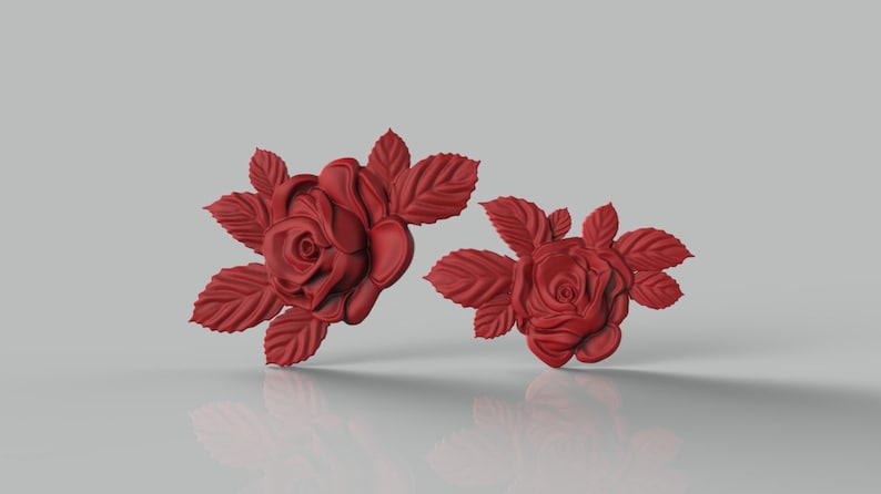 May include: Two red rose flower embellishments with leaves. The roses are 3D and have a realistic look.