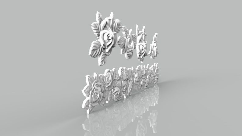 May include: White 3D printed rose floral design with a row of roses and a cluster of roses on top. The design is made of white plastic and has a smooth finish.