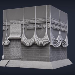 May include: A grayscale model of the Kaaba, a cube-shaped building. The structure features ornate carvings, draped fabric, and a detailed door. The building sits on a rectangular base, with a dark background.