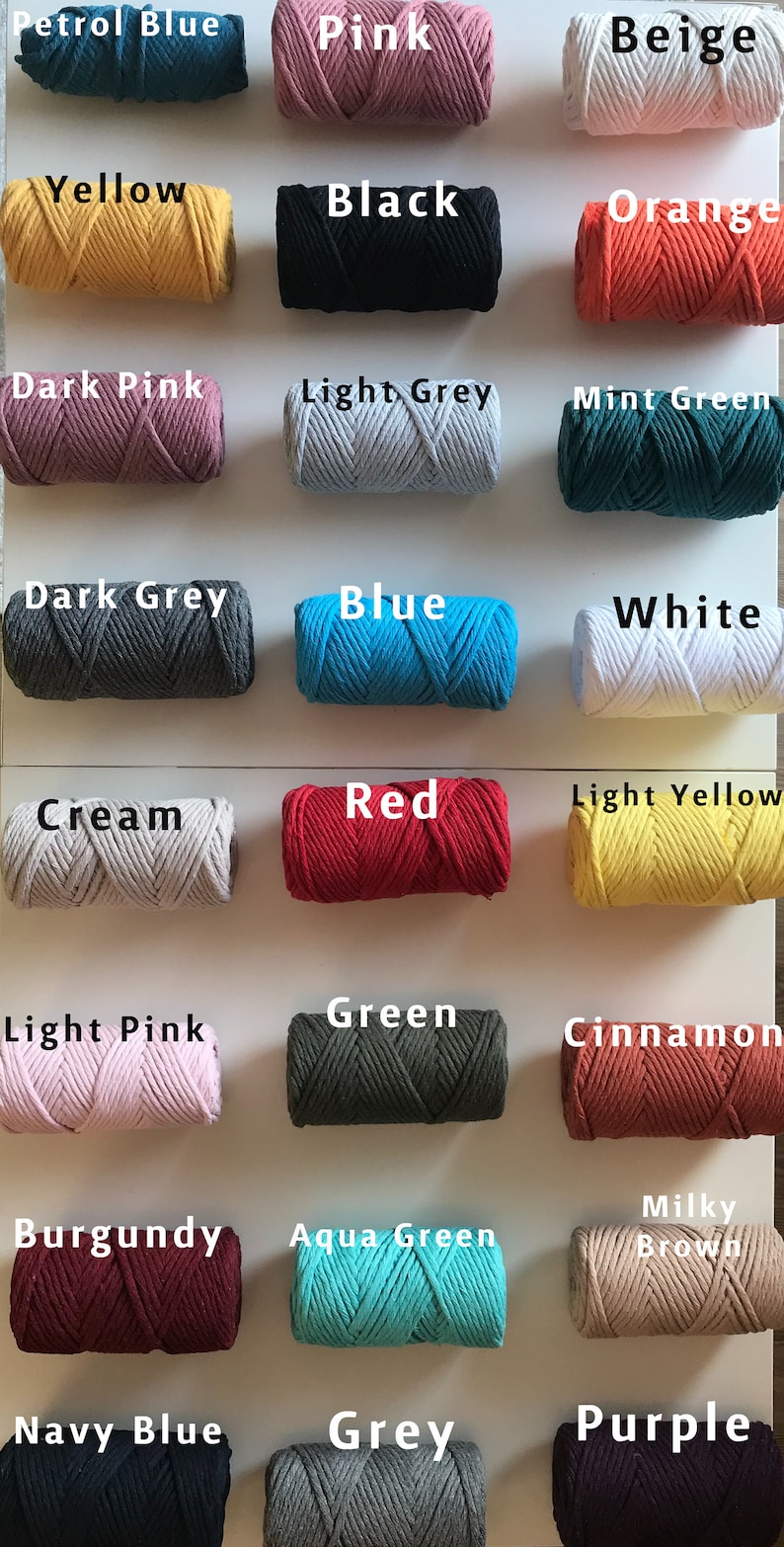 May include: A collection of 18 spools of cotton cord in various colors, including petrol blue, pink, beige, yellow, black, orange, dark pink, light grey, mint green, dark grey, blue, white, cream, red, light yellow, light pink, green, cinnamon, burgundy, aqua green, milky brown, navy blue, grey, and purple.