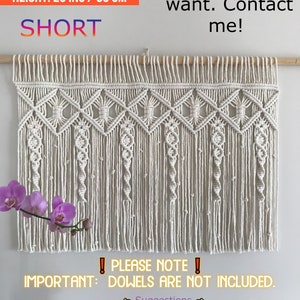 May include: A white macrame wall hanging with a diamond pattern. The hanging is 35 inches wide and 25 inches tall. The text "PLEASE NOTE! IMPORTANT: DOWELS ARE NOT INCLUDED." is written in red and white. The text "Suggestions" is written in black. The text "Hanging these is same as hanging a Curtain. Most of customers are getting rods from Curtain stores or Dowels from DIY stores, Target, Amazon, Home Depot or Lowes." is written in black.