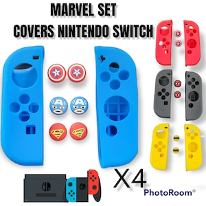 May include: Set of four blue, red, black, and yellow Nintendo Switch Joy-Con covers with matching button caps featuring Marvel characters. The covers feature Captain America, Spider-Man, Batman, and Superman. The text "MARVEL SET COVERS NINTENDO SWITCH X4" is visible in the image.