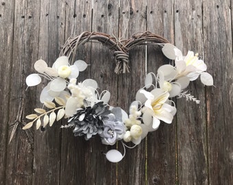 Weathered winter style white Heart shaped Wreath, Handmade arrangement with silver dollar, white Ranunculus, white Lilies and Silver Mum.