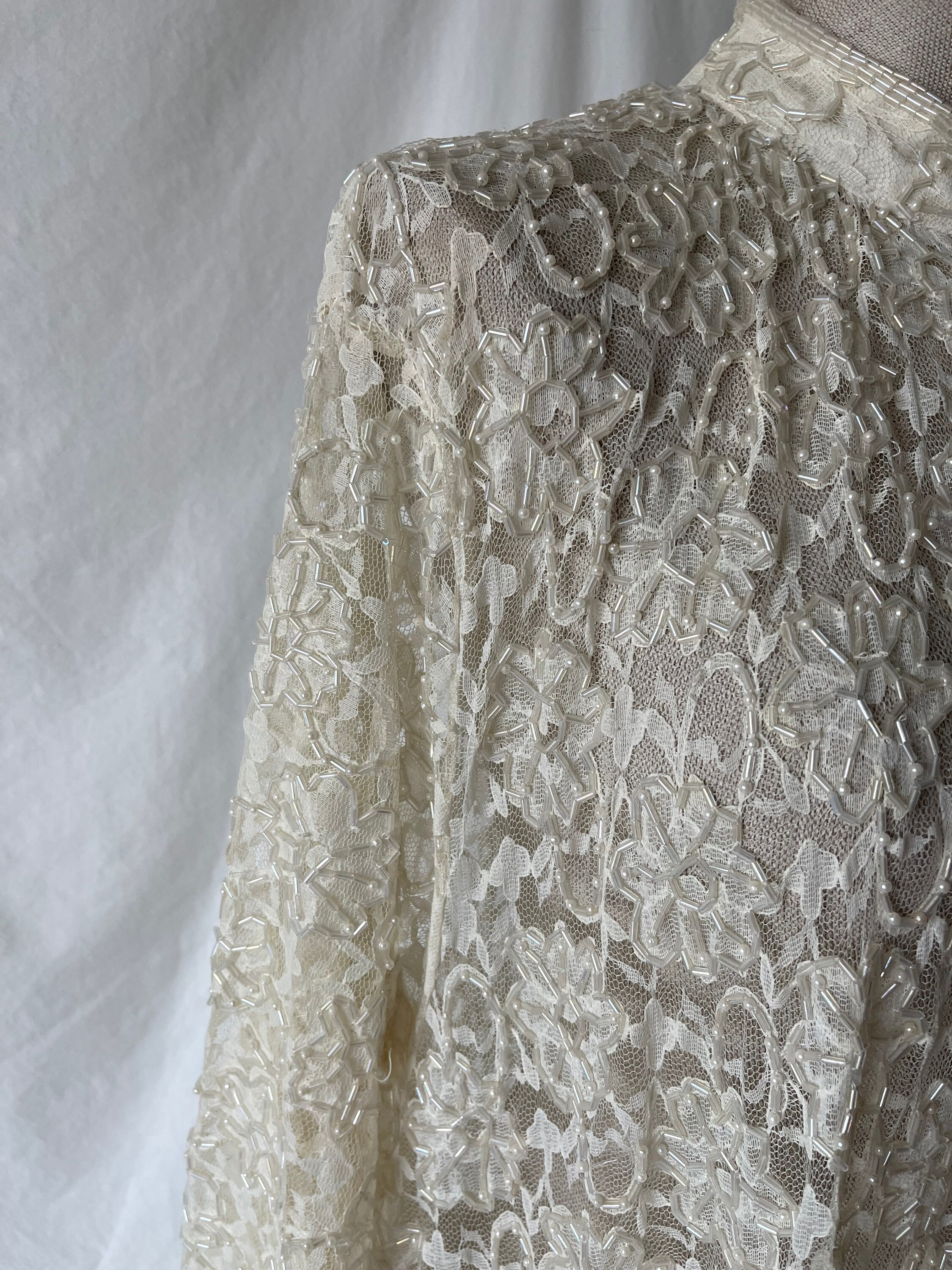 Long Sleeve beaded jacket with  Lace peplum