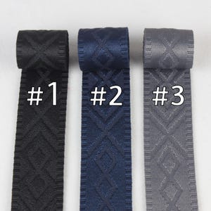 May include: Three rolls of woven webbing in black, navy blue, and gray. Each roll has a diamond pattern and is labeled with a number: #1, #2, and #3.