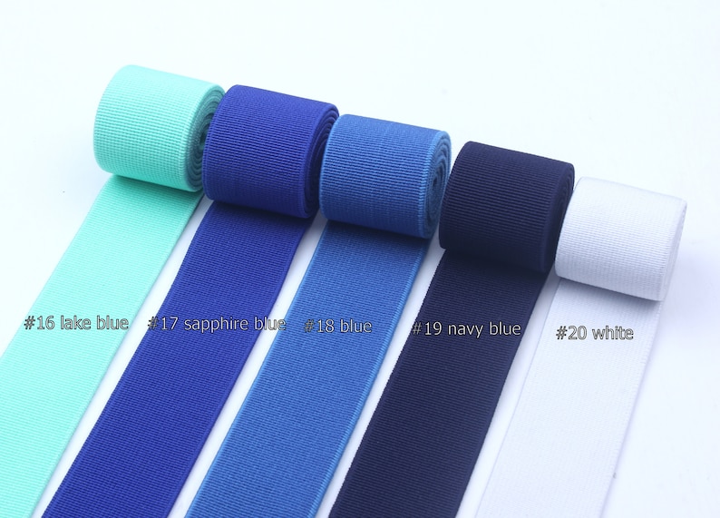 May include: Five rolls of elastic ribbon in different colors: lake blue, sapphire blue, blue, navy blue, and white.  #16 lake blue #17 sapphire blue #18 blue #19 navy blue #20 white