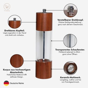 May include: A wooden pepper mill with a clear glass center. The mill features a ceramic grinding mechanism, adjustable knob, and a transparent window to view the contents. The text on the image says "Korpus aus hochwertigem Akazienholz."