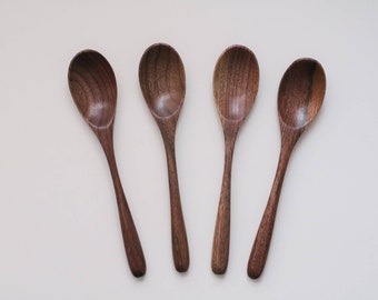 4 elegant wooden spoons made of walnut