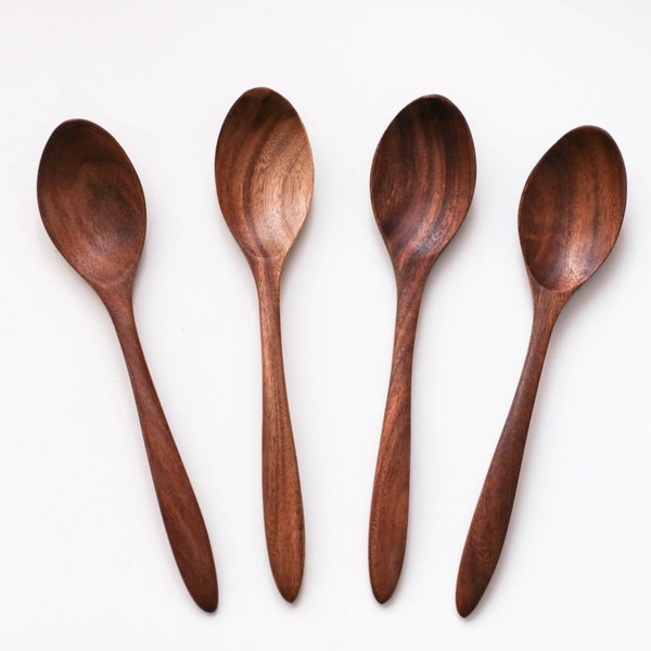 4 elegant wooden spoons made of teak