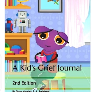 May include: A purple cartoon character with big eyes sits on a stool holding a pink book. The book has the title "A Kid's Grief Journal, 2nd Edition" and the authors' names are listed below. The background is a colorful children's room with a toy robot, a globe, and a picture of a parrot.