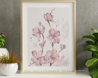 Cuadro decorativo floral en acuarela rosa suave con estampado de magnolias.