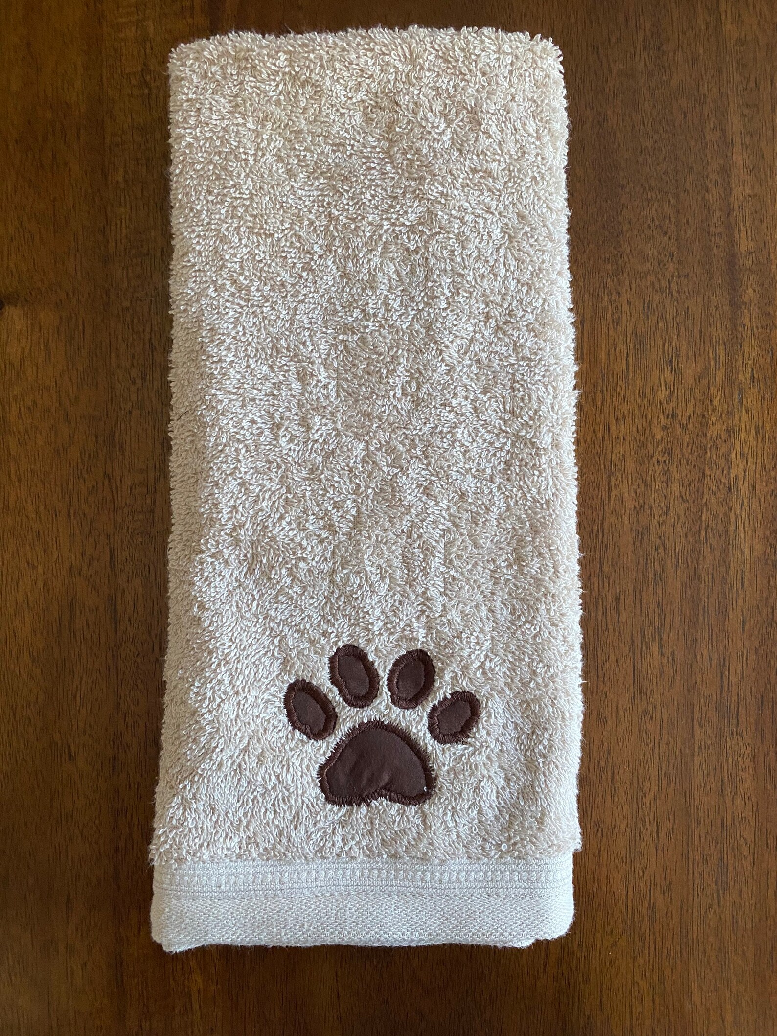 Embroidered paw print hand towel Etsy