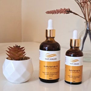Olio biologico per la crescita dei capelli con amla e fieno greco: trattamento a base di erbe per il cuoio capelluto