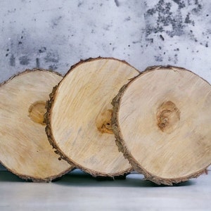 KARAVELLA X Large Wood Slices for Centerpieces - 5 Pack Wood Centerpieces  for Tables, 12-13 inches, Rustic Wedding Centerpiece, Natural Wood Slabs  w/T for Sale in Downey, CA - OfferUp