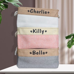 Custom pet organizer with a 100% polyester exterior and cotton interior, available in bone and paw designs. Lightweight, foldable, and easy to clean.