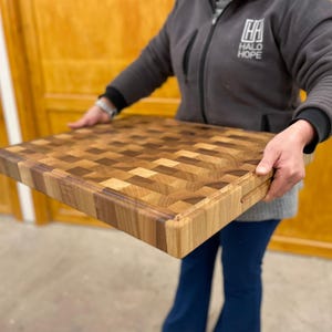 Cutting Board with handgrip and juice groove.