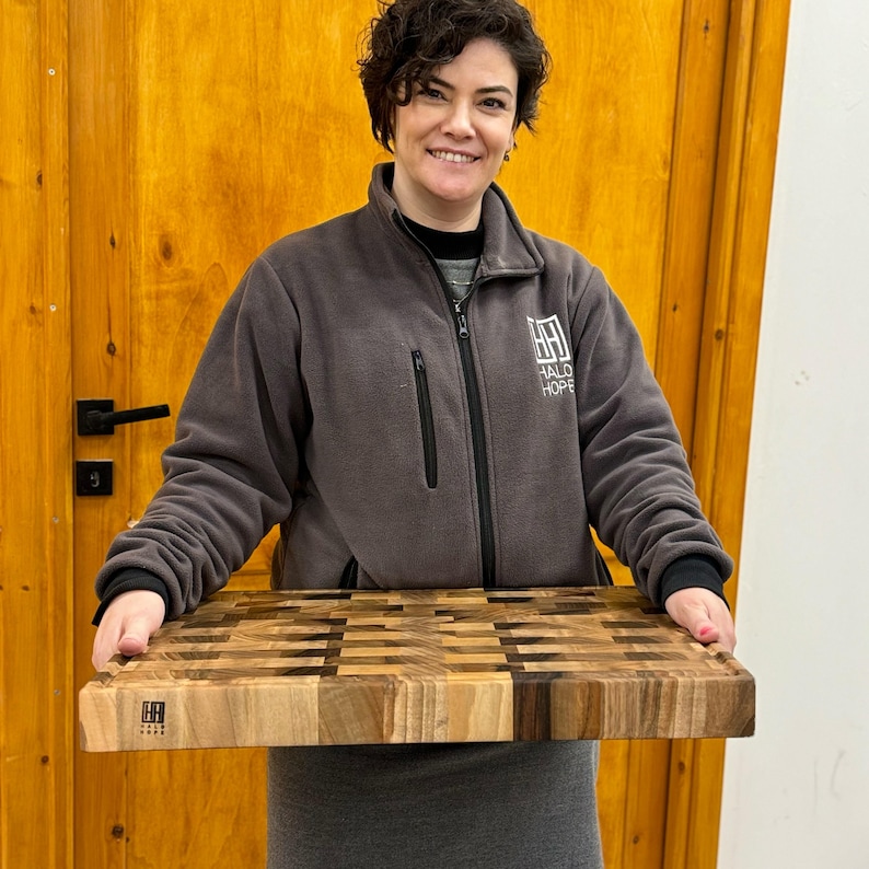 Big Cutting Board to be used as kitchen counter top with the dimensions of 22x16x2 inches.