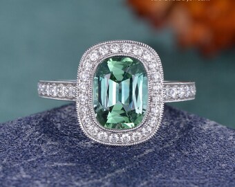 Green Tourmaline Cushion Cut with a Halo of Diamonds main image 0