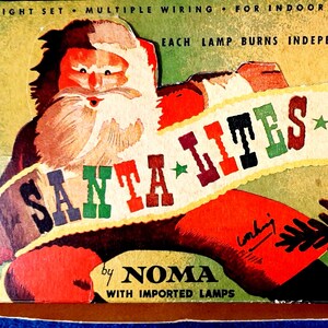 May include: Vintage Christmas light box with a Santa Claus illustration holding a banner reading "SANTA LITES." The box includes text stating "SEVEN LIGHT SET" and "FOR INDOOR USE." A festive holiday decoration.