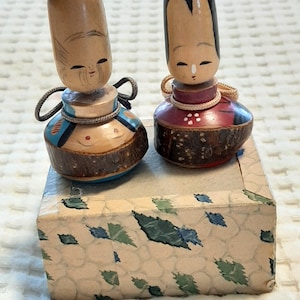 Set of 2 vintage Asian wood dolls  Miniatures  Collectable and a conversational piece  In their original  vintage box Asian art collectable
