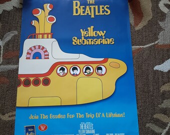 Released to DVD movie poster. The Beatles Yellow Submarine. Measuring 27" by 40 " . Please refer to pics for condition.