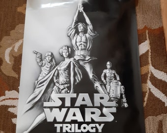 Released to DVD movie poster. Star Wars Trilogy. For the first time on DVD  9.21. MEASURING 27" X 40" Please refer to pics for condition.