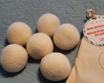 6 Wool dryer balls. 100% wool  Ivory color  Alternative to liquid fabric softener reduces wrinkles Reusable Eco friendly Anti static