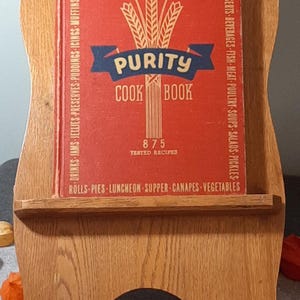 Vintage 1940&#39;s Purity cookbook and vintage oak wood folding book stand Table top book holder Hard cover cook book Solid wood book table