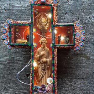 Cross shadow box  Diorama Unique Backlite by battery operated fairy lights Depicting a Saint  a funeral procession sculpted clay flowers