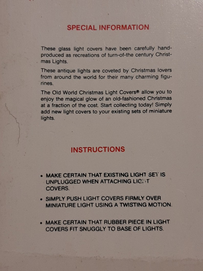 May include: Instructions for attaching glass light covers to miniature Christmas lights. The text reads "Make certain that existing light set is unplugged when attaching light covers. Simply push light covers firmly over miniature light using a twisting motion. Make certain that rubber piece in light covers fit snuggly to base of lights."