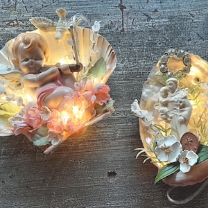 Light up, illuminated Saint and angel themed shell wall art  2 To choose from scallop shell with ceramic angel  Abalone shell with Saint.