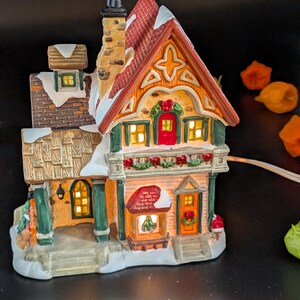 Vintage 1990's Trim Shoppe village collection illuminated porcelain house. Christmas decor Christmas decoration. In original box.