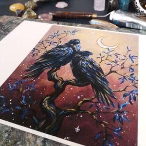 May include: Two black ravens perched on a gold tree branch with blue leaves against a red and gold starry sky with a crescent moon.