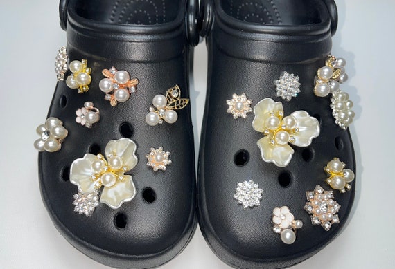 white and orange crocs