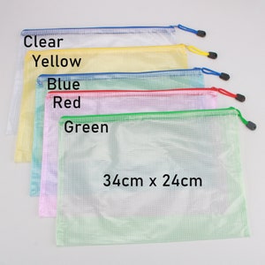 May include: Five clear, zippered document pouches in clear, yellow, blue, red, and green. Each pouch has a colored zipper and pull. The green pouch has the dimensions 34cm x 24cm, which is approximately 13.4 inches x 9.4 inches.