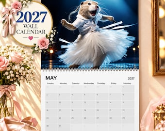 May include: A 2027 wall calendar featuring a prairie dog wearing a white tutu and ballet slippers. The calendar page shows the month of May 2027 with a grid of dates. The top left corner displays the text 2027 WALL CALENDAR with pink roses.