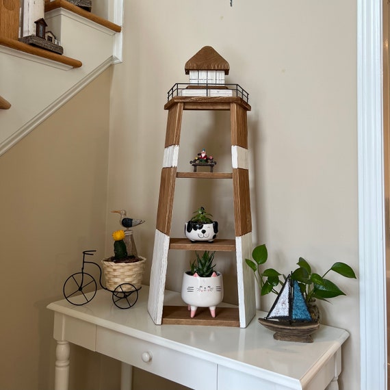 Nautical themed decor in room! - Picture of Lighthouse and Beach