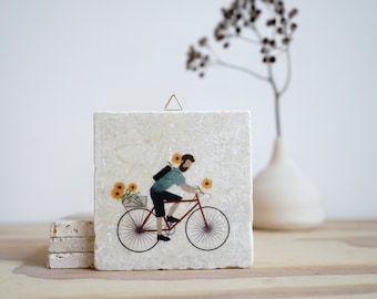 Fliese -  Fahrradfahrer mit Blumen