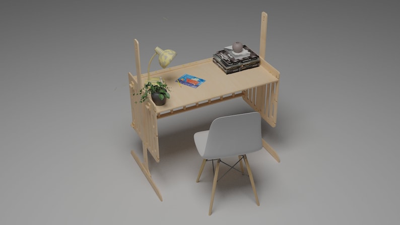 Puede incluir: Un escritorio de madera clara con una silla a juego. El escritorio tiene un acabado de madera clara y natural y cuenta con una peque&ntilde;a l&aacute;mpara, una planta en maceta y una pila de libros. La silla tiene un asiento blanco y patas de madera. El escritorio mide unos 100 cm de largo.