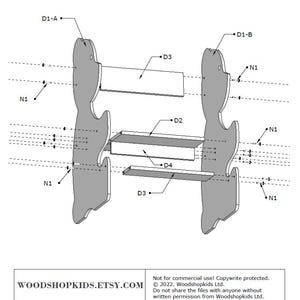May include: An exploded diagram of a wooden shelf unit, featuring two gray side supports and three horizontal shelf pieces. The diagram includes labels such as D1-A, D1-B, D2, D3, D4, and N1. The text "WOODSHOPKIDS.ETSY.COM" is visible.