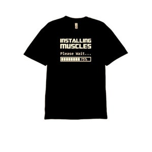 May include: Black t-shirt with a white graphic that says "Installing Muscles" and a progress bar that reads "Please Wait... 75%"