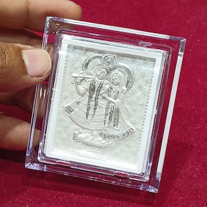 Pure silver Radha Krishna frame with enamel. Budget friendly silver gift ideas. Puja decors. Pure silver gift ideas.