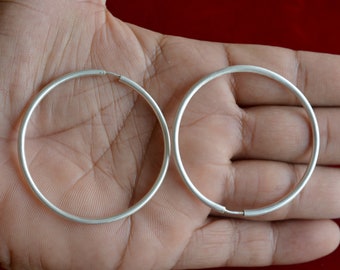 A Pair Of 2 x Sterling Silver 925 Hoop Sleeper Earrings ( 50 , 55, 60, 65 MM )