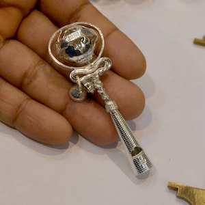 Baby&#39;s first silver rattle. Magic sound baby toy. Personalised newborn rattle gift idea. Chirstening baby keepsake. Custom engraved baby toy