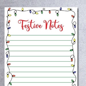 May include: A white printable notepad with a green and black border of Christmas lights. The notepad has the text "Festive Notes" in red and the text "Allison Kay" in red and green at the bottom.