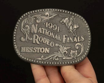 Hebilla de cinturón vintage de rodeo de las Finales Nacionales de Hesston de 1991: Medallas de diseño premiado
