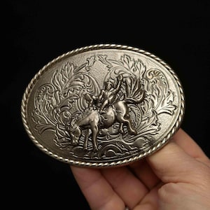 Vintage Silver-Tone Belt Buckle with Cowboy on Bucking Bronco